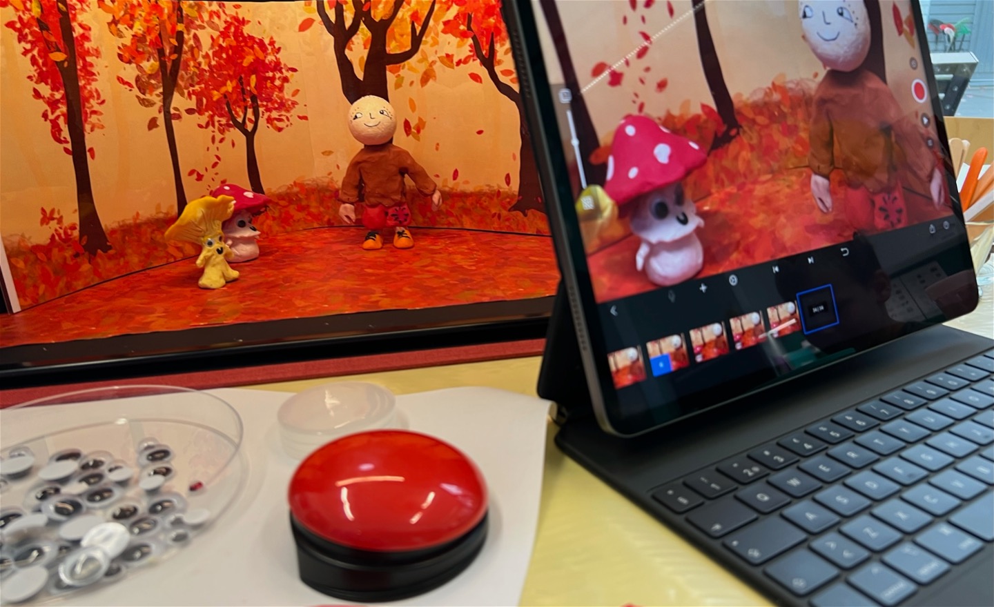 Bild på iPad, animationslåda och knapp för kontaktstyrning